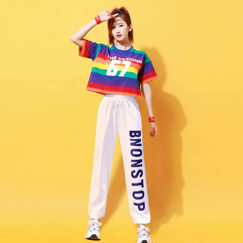Rainbow stripes, short sleeves and white pants